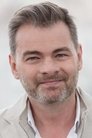 Clovis Cornillac isChris Palmer